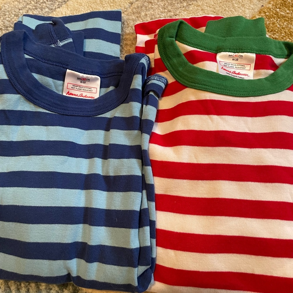 Two pairs of size US 10 (140 cm) Hanna Andersson striped pajamas.